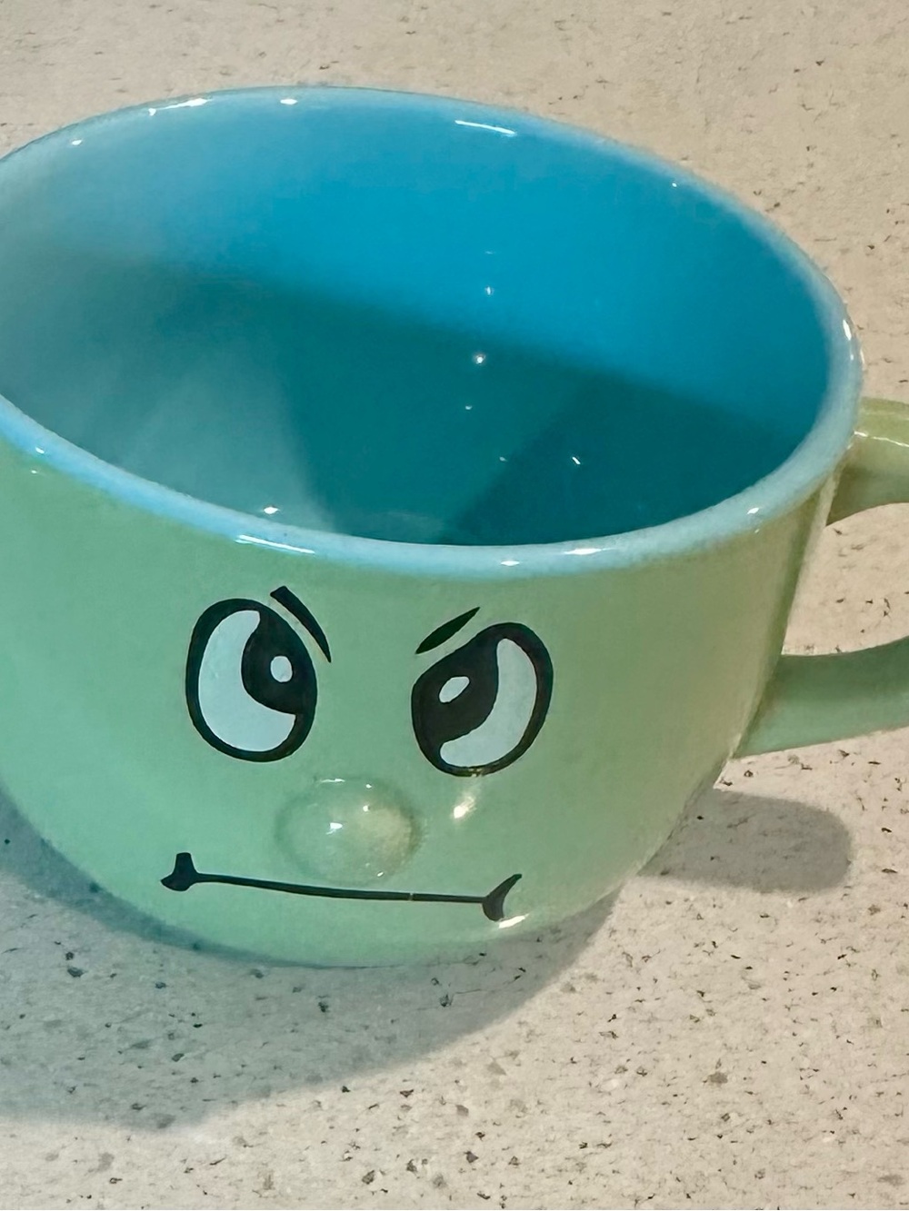 Ceramic Green Face Mug with Blue Interior - Decorative Home Accent